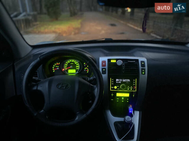 Зеленый Хендай Туксон, объемом двигателя 2 л и пробегом 223 тыс. км за 7950 $, фото 15 на Automoto.ua