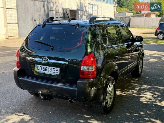 Зелений Хендай Туксон, об'ємом двигуна 1.98 л та пробігом 185 тис. км за 8100 $, фото 14 на Automoto.ua