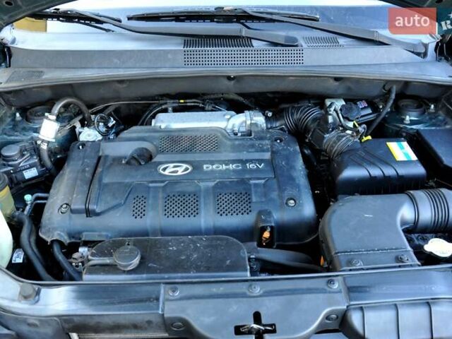 Зеленый Хендай Туксон, объемом двигателя 1.98 л и пробегом 245 тыс. км за 7200 $, фото 37 на Automoto.ua