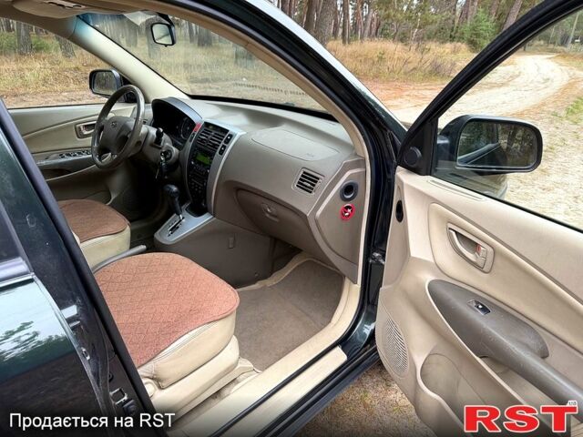 Зеленый Хендай Туксон, объемом двигателя 2 л и пробегом 185 тыс. км за 7950 $, фото 9 на Automoto.ua