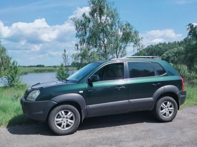 Зелений Хендай Туксон, об'ємом двигуна 2 л та пробігом 280 тис. км за 7000 $, фото 6 на Automoto.ua