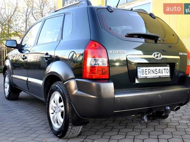 Зеленый Хендай Туксон, объемом двигателя 1.98 л и пробегом 245 тыс. км за 7200 $, фото 12 на Automoto.ua