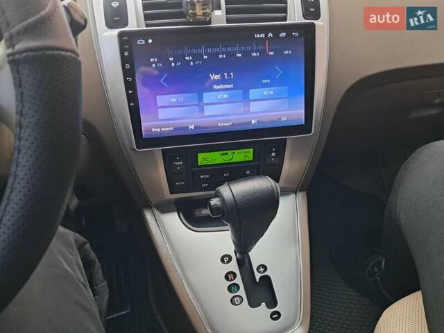 Зеленый Хендай Туксон, объемом двигателя 1.98 л и пробегом 280 тыс. км за 7200 $, фото 20 на Automoto.ua