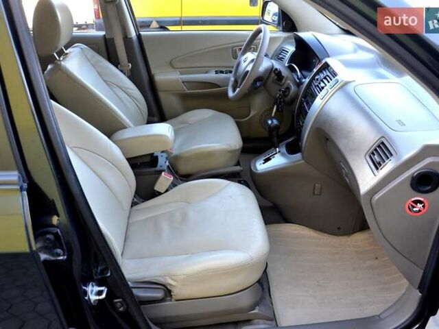 Зеленый Хендай Туксон, объемом двигателя 1.98 л и пробегом 245 тыс. км за 7200 $, фото 26 на Automoto.ua