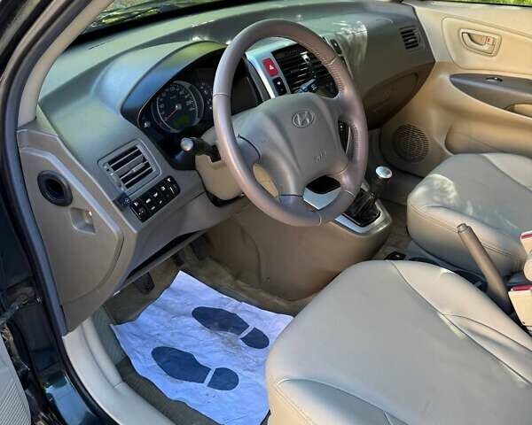 Хендай Туксон 2007 у Чернігові на Automoto.ua Зелений Хендай Туксон, об'ємом двигуна 2 л та пробігом 185 тис. км за 7500 $, фото 15 на Automoto.ua