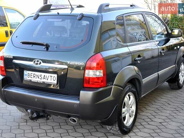 Зеленый Хендай Туксон, объемом двигателя 1.98 л и пробегом 245 тыс. км за 7200 $, фото 7 на Automoto.ua