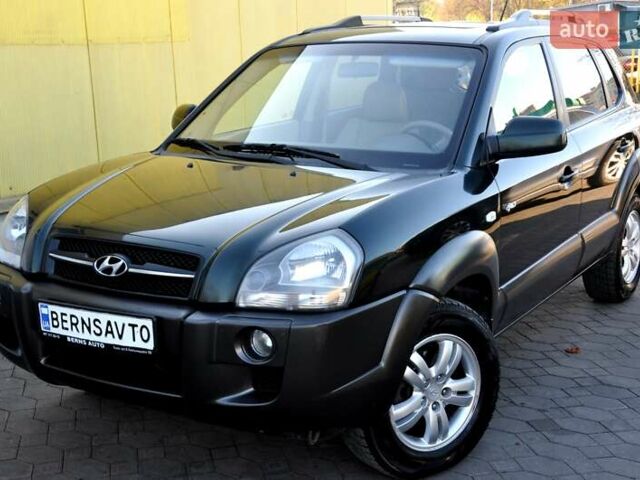 Зеленый Хендай Туксон, объемом двигателя 1.98 л и пробегом 245 тыс. км за 7200 $, фото 38 на Automoto.ua