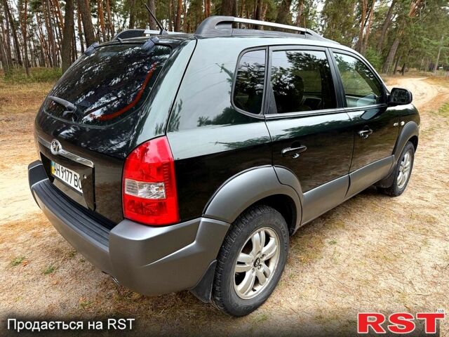 Зеленый Хендай Туксон, объемом двигателя 2 л и пробегом 185 тыс. км за 7950 $, фото 3 на Automoto.ua