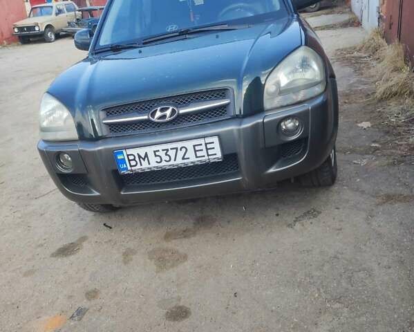 Зелений Хендай Туксон, об'ємом двигуна 1.98 л та пробігом 189 тис. км за 8500 $, фото 3 на Automoto.ua