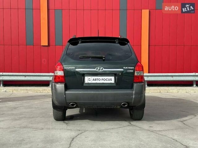 Зеленый Хендай Туксон, объемом двигателя 1.99 л и пробегом 214 тыс. км за 7990 $, фото 6 на Automoto.ua