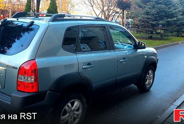 Зелений Хендай Туксон, об'ємом двигуна 2 л та пробігом 227 тис. км за 7800 $, фото 4 на Automoto.ua