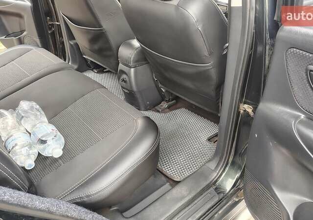 Зелений Хендай Туксон, об'ємом двигуна 1.98 л та пробігом 245 тис. км за 7800 $, фото 18 на Automoto.ua