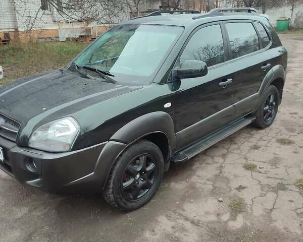 Зеленый Хендай Туксон, объемом двигателя 2 л и пробегом 213 тыс. км за 6500 $, фото 8 на Automoto.ua