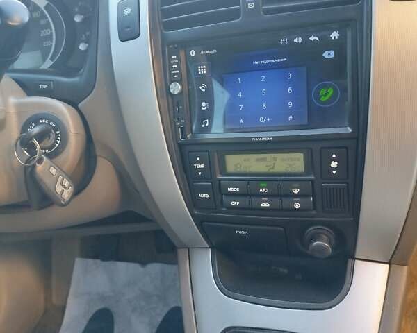 Зеленый Хендай Туксон, объемом двигателя 2 л и пробегом 185 тыс. км за 7899 $, фото 37 на Automoto.ua