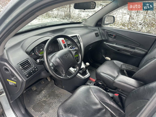 Зелений Хендай Туксон, об'ємом двигуна 2 л та пробігом 248 тис. км за 6999 $, фото 17 на Automoto.ua