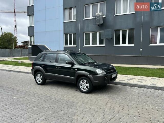 Зеленый Хендай Туксон, объемом двигателя 2 л и пробегом 82 тыс. км за 9950 $, фото 67 на Automoto.ua