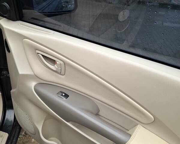 Зелений Хендай Туксон, об'ємом двигуна 1.98 л та пробігом 280 тис. км за 8500 $, фото 17 на Automoto.ua