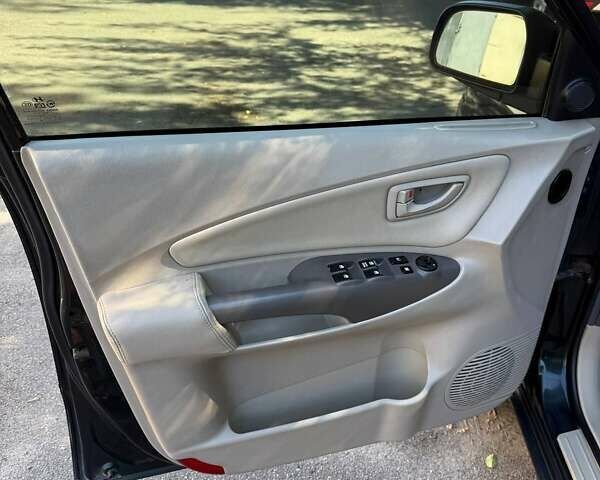 Зелений Хендай Туксон, об'ємом двигуна 1.98 л та пробігом 185 тис. км за 8100 $, фото 34 на Automoto.ua