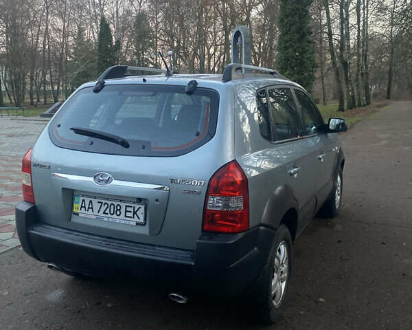 Зеленый Хендай Туксон, объемом двигателя 2 л и пробегом 223 тыс. км за 7950 $, фото 12 на Automoto.ua