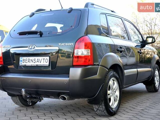 Зеленый Хендай Туксон, объемом двигателя 1.98 л и пробегом 245 тыс. км за 7200 $, фото 8 на Automoto.ua