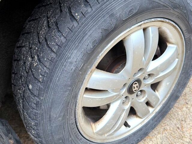 Зеленый Хендай Туксон, объемом двигателя 2 л и пробегом 185 тыс. км за 7950 $, фото 12 на Automoto.ua