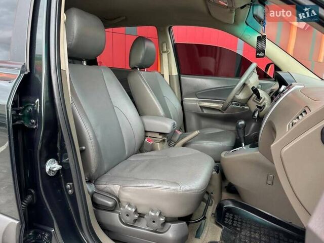 Зеленый Хендай Туксон, объемом двигателя 1.99 л и пробегом 214 тыс. км за 7290 $, фото 11 на Automoto.ua