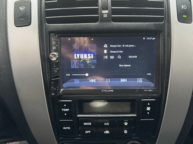 Зеленый Хендай Туксон, объемом двигателя 2 л и пробегом 190 тыс. км за 6150 $, фото 10 на Automoto.ua