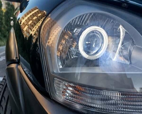 Зелений Хендай Туксон, об'ємом двигуна 1.98 л та пробігом 185 тис. км за 8100 $, фото 1 на Automoto.ua
