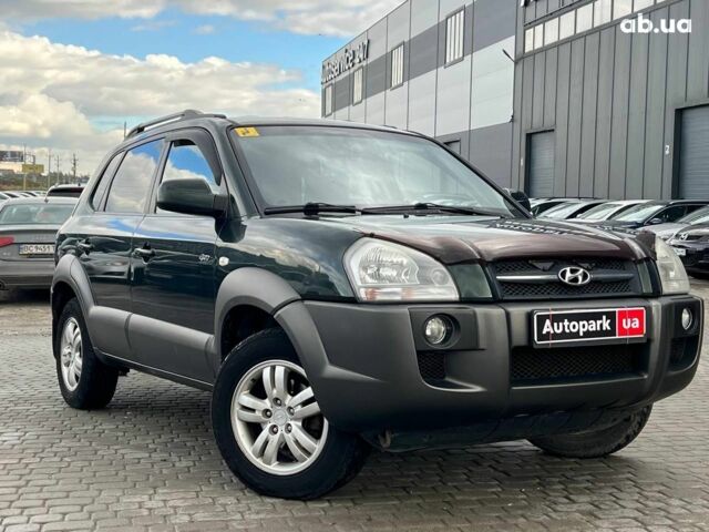 Зеленый Хендай Туксон, объемом двигателя 2 л и пробегом 223 тыс. км за 8540 $, фото 2 на Automoto.ua