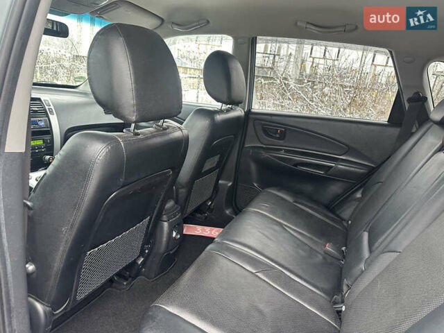 Зелений Хендай Туксон, об'ємом двигуна 2 л та пробігом 248 тис. км за 6999 $, фото 10 на Automoto.ua