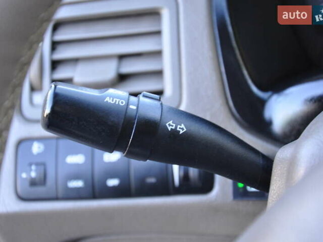 Зеленый Хендай Туксон, объемом двигателя 1.98 л и пробегом 245 тыс. км за 7200 $, фото 33 на Automoto.ua