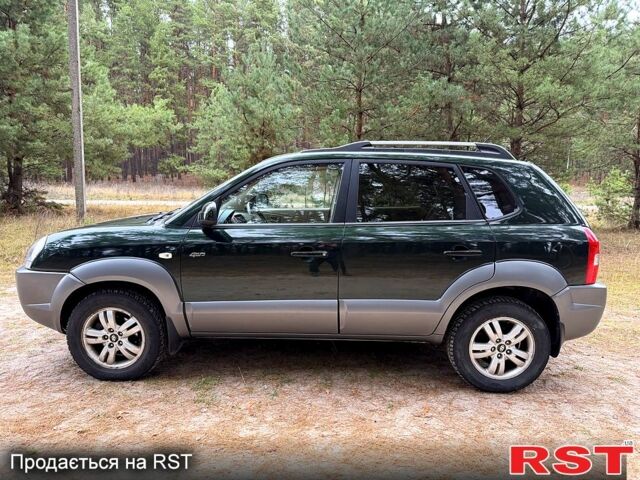 Зеленый Хендай Туксон, объемом двигателя 2 л и пробегом 185 тыс. км за 7950 $, фото 4 на Automoto.ua