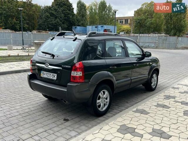 Зеленый Хендай Туксон, объемом двигателя 2 л и пробегом 82 тыс. км за 9950 $, фото 24 на Automoto.ua