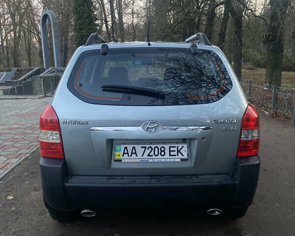 Зеленый Хендай Туксон, объемом двигателя 2 л и пробегом 223 тыс. км за 7950 $, фото 10 на Automoto.ua