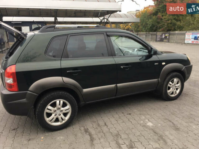 Зеленый Хендай Туксон, объемом двигателя 2 л и пробегом 223 тыс. км за 8500 $, фото 8 на Automoto.ua