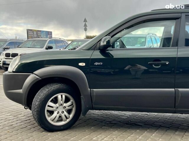 Зеленый Хендай Туксон, объемом двигателя 2 л и пробегом 223 тыс. км за 8540 $, фото 11 на Automoto.ua