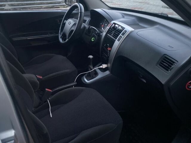 Зеленый Хендай Туксон, объемом двигателя 2 л и пробегом 223 тыс. км за 7950 $, фото 6 на Automoto.ua