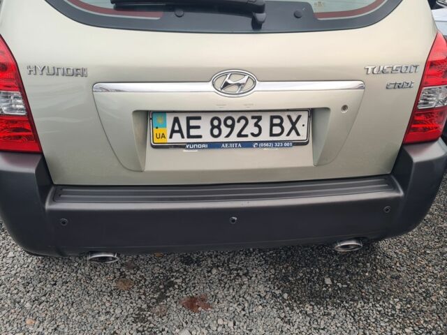 Зелений Хендай Туксон, об'ємом двигуна 2 л та пробігом 149 тис. км за 9900 $, фото 13 на Automoto.ua