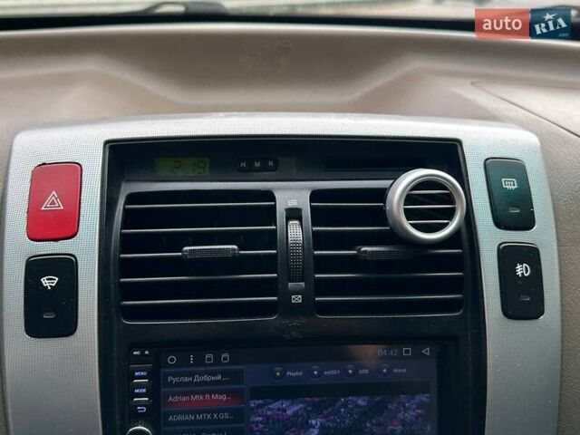 Зеленый Хендай Туксон, объемом двигателя 1.99 л и пробегом 214 тыс. км за 7990 $, фото 21 на Automoto.ua