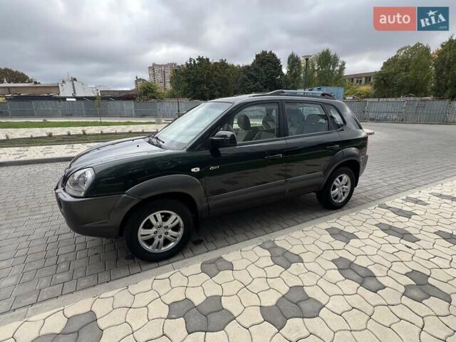 Зеленый Хендай Туксон, объемом двигателя 2 л и пробегом 82 тыс. км за 9950 $, фото 51 на Automoto.ua