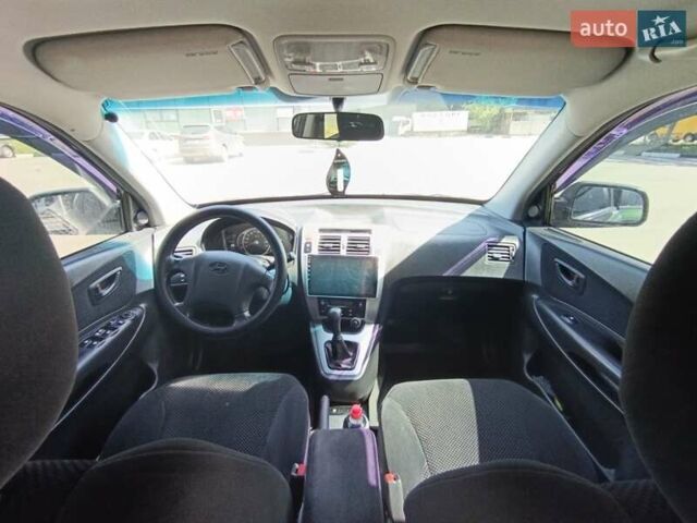 Зеленый Хендай Туксон, объемом двигателя 2 л и пробегом 203 тыс. км за 7800 $, фото 6 на Automoto.ua