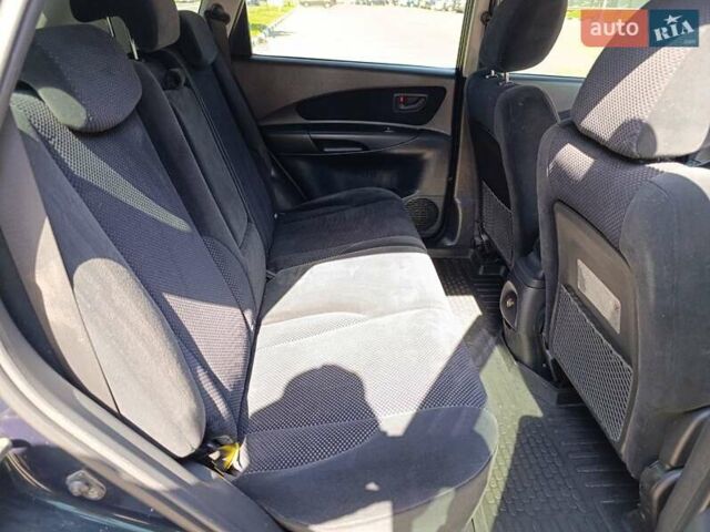 Зеленый Хендай Туксон, объемом двигателя 2 л и пробегом 203 тыс. км за 7800 $, фото 5 на Automoto.ua