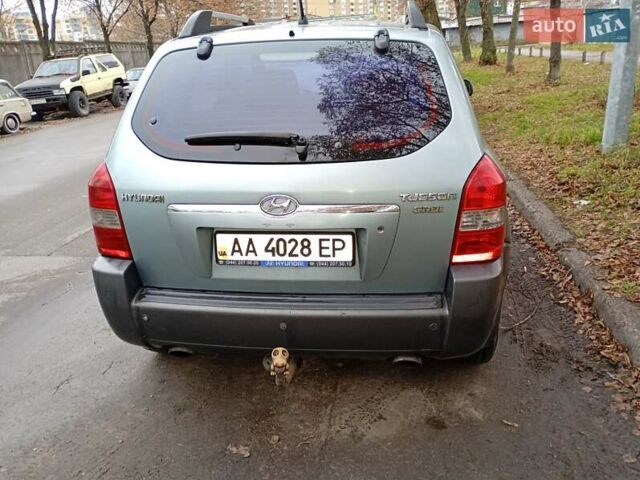 Зелений Хендай Туксон, об'ємом двигуна 1.99 л та пробігом 218 тис. км за 6500 $, фото 10 на Automoto.ua