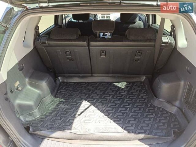 Зеленый Хендай Туксон, объемом двигателя 2 л и пробегом 203 тыс. км за 7800 $, фото 8 на Automoto.ua