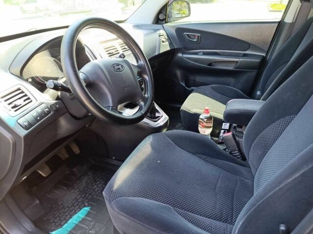 Зелений Хендай Туксон, об'ємом двигуна 2 л та пробігом 203 тис. км за 7200 $, фото 5 на Automoto.ua