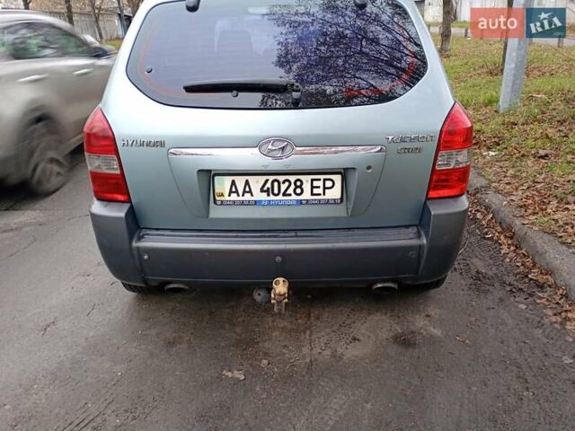 Зелений Хендай Туксон, об'ємом двигуна 1.99 л та пробігом 218 тис. км за 6500 $, фото 6 на Automoto.ua