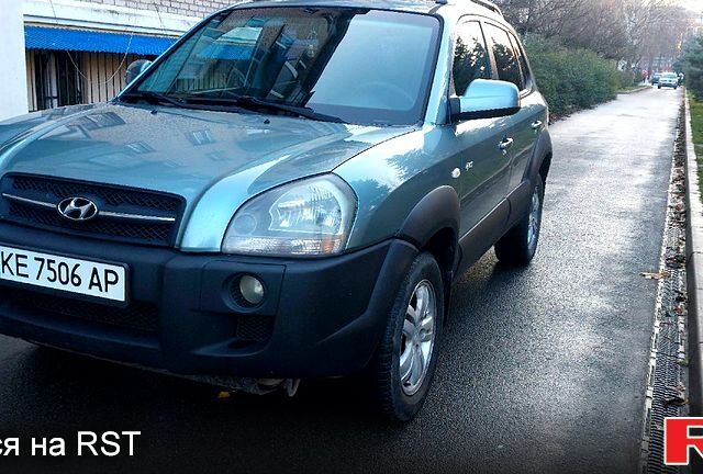 Зелений Хендай Туксон, об'ємом двигуна 2 л та пробігом 227 тис. км за 7800 $, фото 5 на Automoto.ua