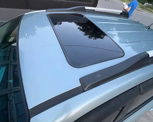 Зеленый Хендай Туксон, объемом двигателя 1.98 л и пробегом 205 тыс. км за 7700 $, фото 12 на Automoto.ua