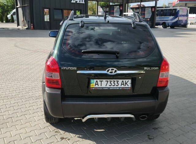 Зелений Хендай Туксон, об'ємом двигуна 2 л та пробігом 208 тис. км за 8500 $, фото 5 на Automoto.ua