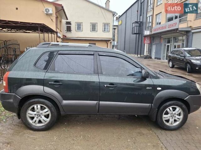 Зелений Хендай Туксон, об'ємом двигуна 1.98 л та пробігом 280 тис. км за 8500 $, фото 5 на Automoto.ua